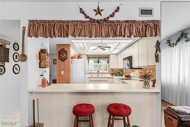 Enjoy great tropical, serene lake and golf views from this on The Landings Yacht, Golf and Tennis Club in Florida - for sale on GolfHomes.com, golf home, golf lot