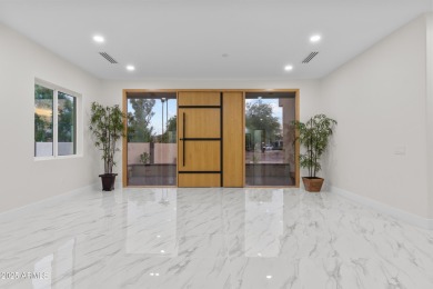 Experience luxury living in this stunning contemporary residence on The Orange Tree Golf Resort in Arizona - for sale on GolfHomes.com, golf home, golf lot