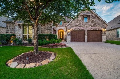 Charming curb appeal and a beautifully detailed brick and stone on The Tribute At the Colony in Texas - for sale on GolfHomes.com, golf home, golf lot