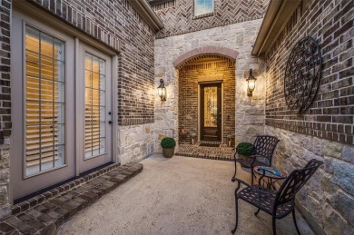 Charming curb appeal and a beautifully detailed brick and stone on The Tribute At the Colony in Texas - for sale on GolfHomes.com, golf home, golf lot