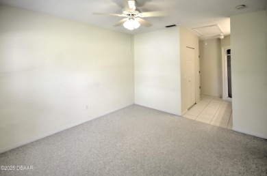 Golf Villa with an amazing golf and water view! This bright and on Turnbull Bay Golf Club in Florida - for sale on GolfHomes.com, golf home, golf lot