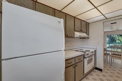 Welcome to this charming condo located in the desirable Palm on Leisureville Community Golf Course in Florida - for sale on GolfHomes.com, golf home, golf lot