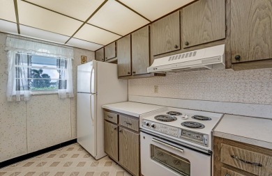 Welcome to this charming condo located in the desirable Palm on Leisureville Community Golf Course in Florida - for sale on GolfHomes.com, golf home, golf lot