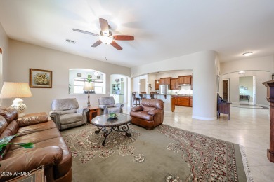 Welcome to this stunning energy-efficient 4-bedroom, 2.5-bath on Estrella Mountain Ranch Golf Course in Arizona - for sale on GolfHomes.com, golf home, golf lot