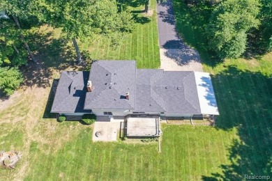 Take a look at this beautiful setting, it's only had one owner on IMA Brookwood Golf Course in Michigan - for sale on GolfHomes.com, golf home, golf lot