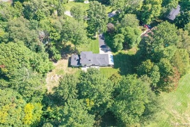 Take a look at this beautiful setting, it's only had one owner on IMA Brookwood Golf Course in Michigan - for sale on GolfHomes.com, golf home, golf lot