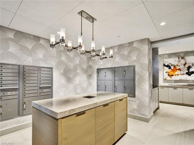 NEW PRICE!! Fabulous first floor end unit-with-a-view in the on Club at Pelican Bay Golf Course in Florida - for sale on GolfHomes.com, golf home, golf lot