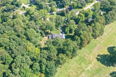 Take a look at this beautiful setting, it's only had one owner on IMA Brookwood Golf Course in Michigan - for sale on GolfHomes.com, golf home, golf lot