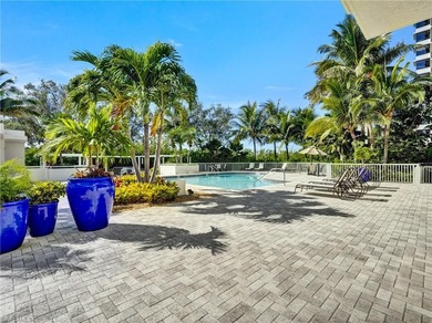 NEW PRICE!! Fabulous first floor end unit-with-a-view in the on Club at Pelican Bay Golf Course in Florida - for sale on GolfHomes.com, golf home, golf lot