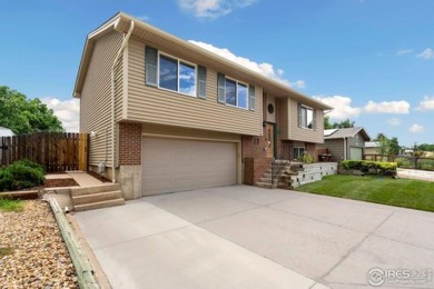 Welcome to this central Windsor oasis! This home has been on Pelican Lakes Golf and Country Club in Colorado - for sale on GolfHomes.com, golf home, golf lot