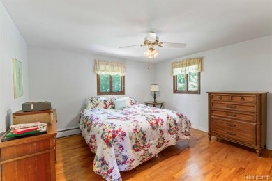 Take a look at this beautiful setting, it's only had one owner on IMA Brookwood Golf Course in Michigan - for sale on GolfHomes.com, golf home, golf lot
