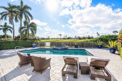 Set in a peaceful and scenic location, this 3 bedroom, 3 and a on Boca Delray Golf and Country Club in Florida - for sale on GolfHomes.com, golf home, golf lot