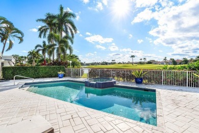 Set in a peaceful and scenic location, this 3 bedroom, 3 and a on Boca Delray Golf and Country Club in Florida - for sale on GolfHomes.com, golf home, golf lot