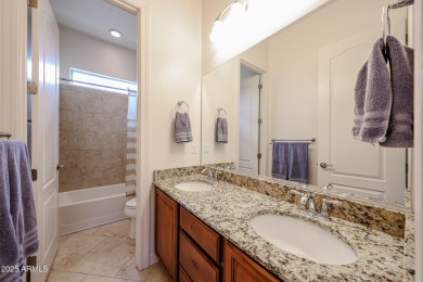 Welcome to this stunning energy-efficient 4-bedroom, 2.5-bath on Estrella Mountain Ranch Golf Course in Arizona - for sale on GolfHomes.com, golf home, golf lot