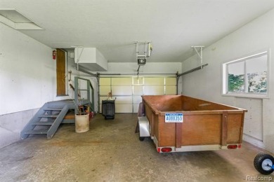 Take a look at this beautiful setting, it's only had one owner on IMA Brookwood Golf Course in Michigan - for sale on GolfHomes.com, golf home, golf lot