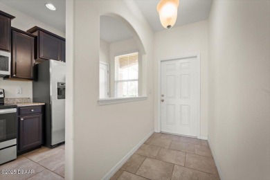 Live the Florida dream in this move‑in‑ready 3BR/2 on LPGA International Golf Course in Florida - for sale on GolfHomes.com, golf home, golf lot