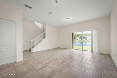 Live the Florida dream in this move‑in‑ready 3BR/2 on LPGA International Golf Course in Florida - for sale on GolfHomes.com, golf home, golf lot