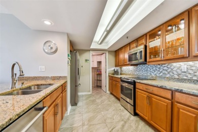 THIS **TURNKEY** condo in building *H* of the Palma Del Mar on Isla Del Sol Yacht and Country Club in Florida - for sale on GolfHomes.com, golf home, golf lot