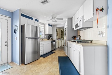 Welcome Home to Tamiami Village 55+! This beautifully maintained on Six Lakes Country Club in Florida - for sale on GolfHomes.com, golf home, golf lot