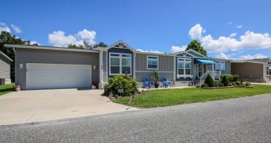 Welcome to your dream home. This beautiful and popular Admiral on Water Oak Country Club Estates in Florida - for sale on GolfHomes.com, golf home, golf lot