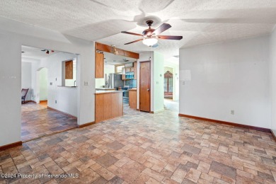 There's room for all the family with this 4 bedroom/2 bathroom on Brooksville Country Club At Majestic Oaks in Florida - for sale on GolfHomes.com, golf home, golf lot