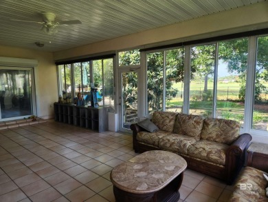 Golf Course living in the heart of Gulf Shores!  This 3 bed 2.5 on The Golf Club of the Wharf in Alabama - for sale on GolfHomes.com, golf home, golf lot