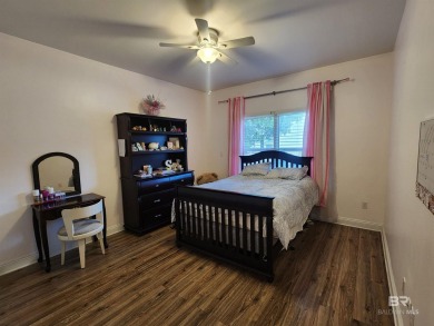Golf Course living in the heart of Gulf Shores!  This 3 bed 2.5 on The Golf Club of the Wharf in Alabama - for sale on GolfHomes.com, golf home, golf lot