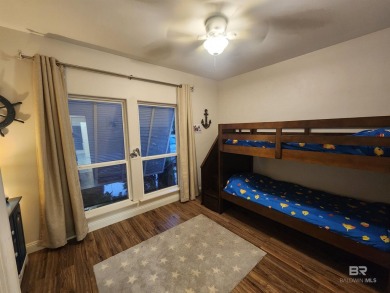 Golf Course living in the heart of Gulf Shores!  This 3 bed 2.5 on The Golf Club of the Wharf in Alabama - for sale on GolfHomes.com, golf home, golf lot