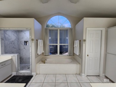 Golf Course living in the heart of Gulf Shores!  This 3 bed 2.5 on The Golf Club of the Wharf in Alabama - for sale on GolfHomes.com, golf home, golf lot