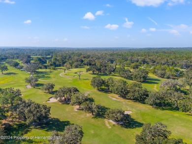 There's room for all the family with this 4 bedroom/2 bathroom on Brooksville Country Club At Majestic Oaks in Florida - for sale on GolfHomes.com, golf home, golf lot