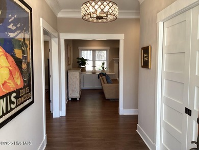 Contemporary tidal home built in 2020. Move-in-ready! Only home on Cypress Landing Golf Club in North Carolina - for sale on GolfHomes.com, golf home, golf lot