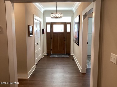 Contemporary tidal home built in 2020. Move-in-ready! Only home on Cypress Landing Golf Club in North Carolina - for sale on GolfHomes.com, golf home, golf lot