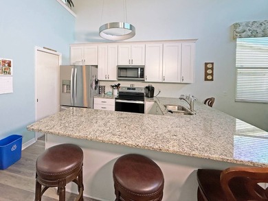 Check out this furnished 2BR/2 bath resort home with RV port on The Great Outdoors Golf and Country Club in Florida - for sale on GolfHomes.com, golf home, golf lot