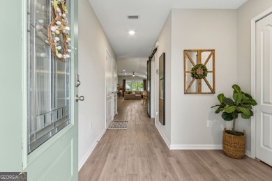 Welcome to 310 Chinquapin Drive, where designer style meets on The Club At Osprey Cove in Georgia - for sale on GolfHomes.com, golf home, golf lot