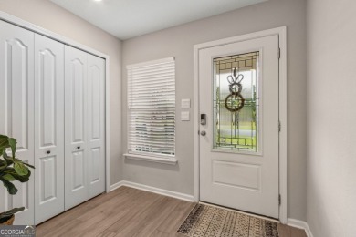 Welcome to 310 Chinquapin Drive, where designer style meets on The Club At Osprey Cove in Georgia - for sale on GolfHomes.com, golf home, golf lot