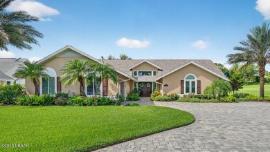 Stunning Waterfront Home in the Sought-After Gated Community of on Sugar Mill Country Club in Florida - for sale on GolfHomes.com, golf home, golf lot