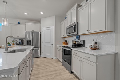 Experience Coastal Living at Its Best in Brunswick Plantation! on Brunswick Plantation and Golf Resorts in North Carolina - for sale on GolfHomes.com, golf home, golf lot