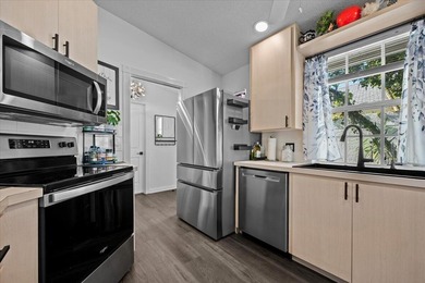 Move-in ready! Beautifully upgraded home with 2 bedrooms, 2 bath on The Golf Club of Jupiter in Florida - for sale on GolfHomes.com, golf home, golf lot