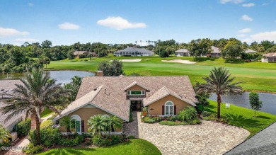 Stunning Waterfront Home in the Sought-After Gated Community of on Sugar Mill Country Club in Florida - for sale on GolfHomes.com, golf home, golf lot