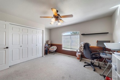 Welcome to this stunning 5-bedroom, 3-bathroom ranch-style home on Desert Hawk At Pueblo West in Colorado - for sale on GolfHomes.com, golf home, golf lot