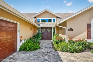Stunning Waterfront Home in the Sought-After Gated Community of on Sugar Mill Country Club in Florida - for sale on GolfHomes.com, golf home, golf lot