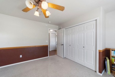 Welcome to this stunning 5-bedroom, 3-bathroom ranch-style home on Desert Hawk At Pueblo West in Colorado - for sale on GolfHomes.com, golf home, golf lot