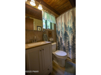 Beautifully Maintained Chalet in The Hideout - 3BR/2BA on Wooded on The Hideout Golf in Pennsylvania - for sale on GolfHomes.com, golf home, golf lot