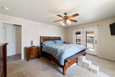 Welcome to this stunning 5-bedroom, 3-bathroom ranch-style home on Desert Hawk At Pueblo West in Colorado - for sale on GolfHomes.com, golf home, golf lot