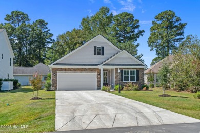 Experience Coastal Living at Its Best in Brunswick Plantation! on Brunswick Plantation and Golf Resorts in North Carolina - for sale on GolfHomes.com, golf home, golf lot