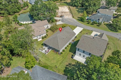 Experience Coastal Living at Its Best in Brunswick Plantation! on Brunswick Plantation and Golf Resorts in North Carolina - for sale on GolfHomes.com, golf home, golf lot