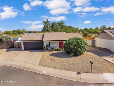 Welcome to this beautifully updated three-bedroom, two-bath home on Paradise Valley Park Golf Course in Arizona - for sale on GolfHomes.com, golf home, golf lot