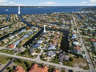 PRIME WATERFRONT LOCATION IN PUNTA GORDA ISLES! Great sailboat on Saint Andrews South Golf Club in Florida - for sale on GolfHomes.com, golf home, golf lot