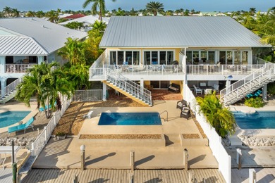 Welcome to this inviting east facing, waterfront, stilted half on Key Colony Beach Golf Course in Florida - for sale on GolfHomes.com, golf home, golf lot