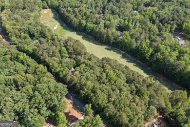 This gently sloped lot backs directly up to the lush fairways of on The Highlands Course at Lake Arrowhead in Georgia - for sale on GolfHomes.com, golf home, golf lot
